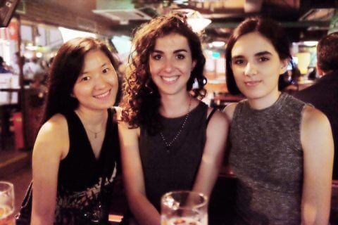 Three women sitting at a table at Leo's Bar in Shanghai