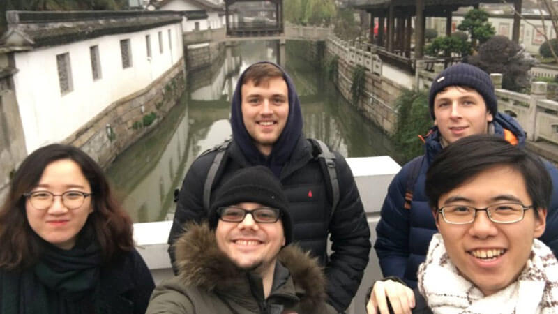 LTL Students standing on a bridge on Pingjiang Road in Suzhou