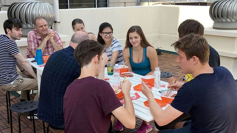 Students having lunch together at the LTL BEijing rooftop